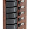 Electric control panel with flush rocker switches